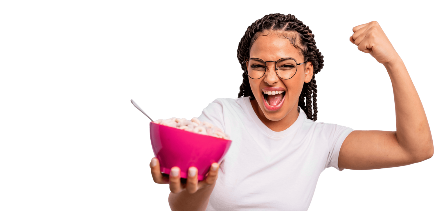 An excited woman with a bowl of snacks