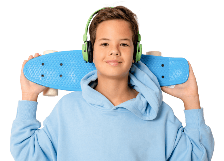 A child wearing headphones, standing with a skateboard, ready for an exciting ride in a lively environment.